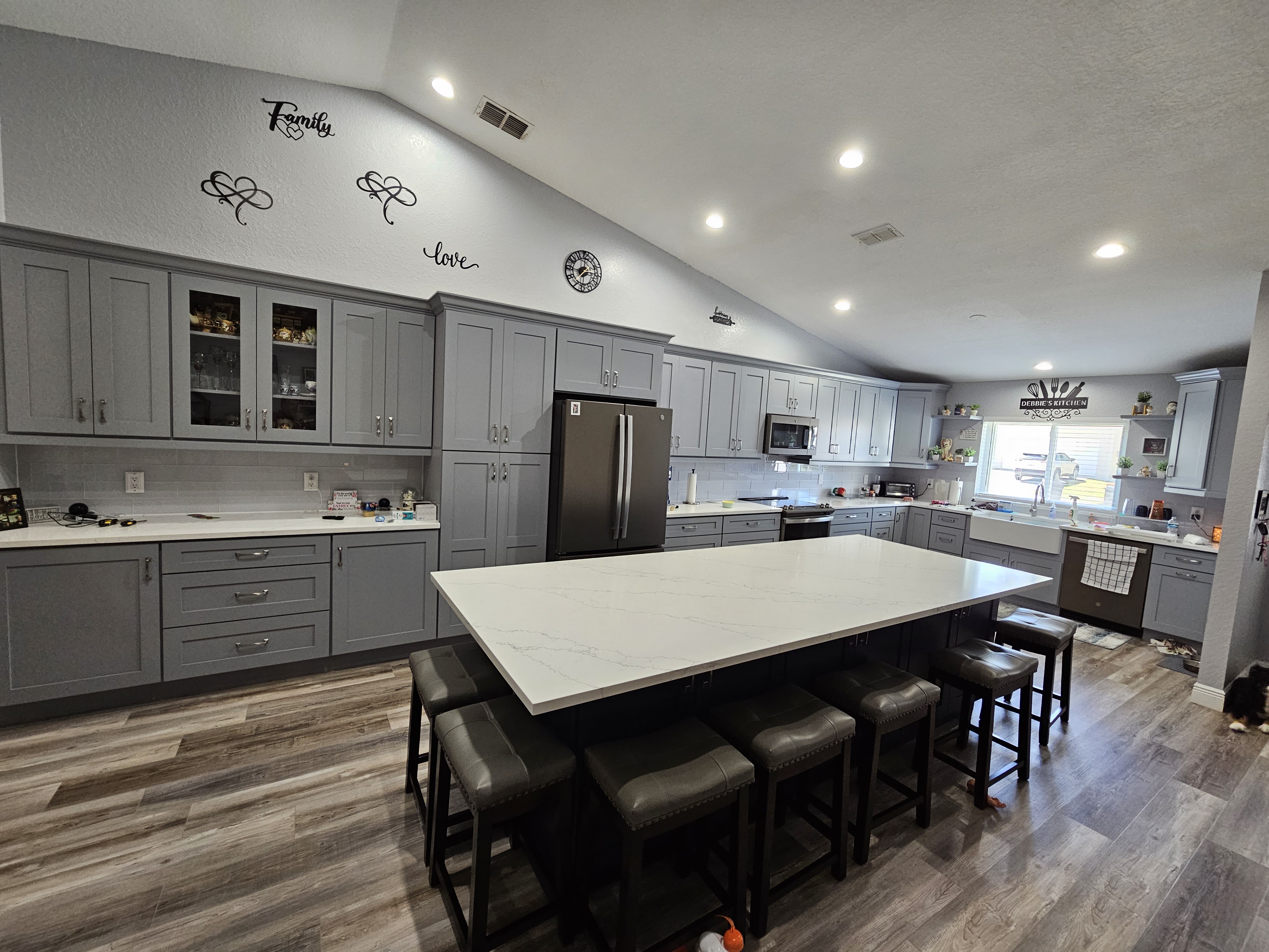 Grey shaker kitchen with a navy island